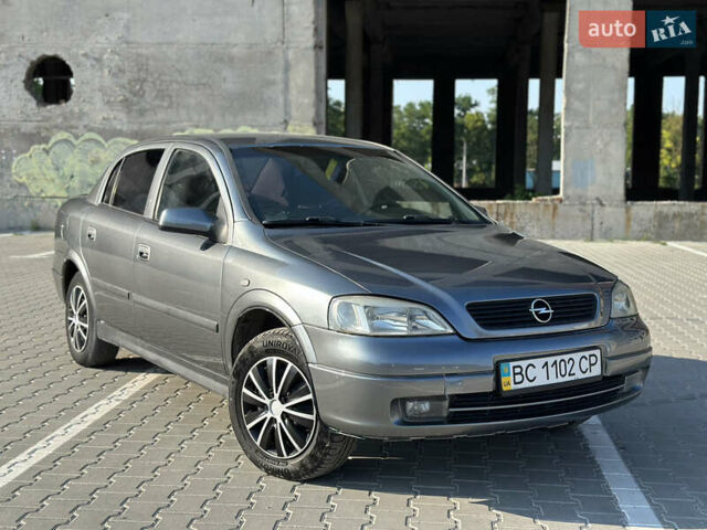Серый Опель Астра, объемом двигателя 1.4 л и пробегом 211 тыс. км за 2999 $, фото 1 на Automoto.ua