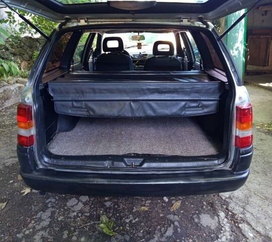 Серый Опель Астра, объемом двигателя 1.4 л и пробегом 39 тыс. км за 1400 $, фото 1 на Automoto.ua