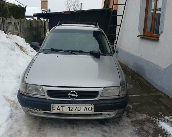 Серый Опель Астра, объемом двигателя 1.4 л и пробегом 300 тыс. км за 1000 $, фото 1 на Automoto.ua