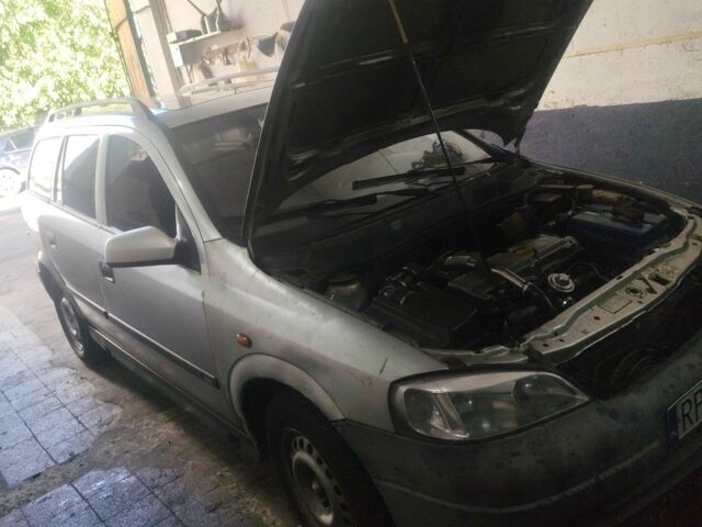 Серый Опель Астра, объемом двигателя 2 л и пробегом 380 тыс. км за 1400 $, фото 1 на Automoto.ua