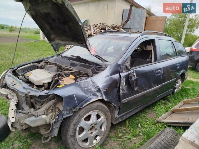 Серый Опель Астра, объемом двигателя 1.8 л и пробегом 300 тыс. км за 980 $, фото 1 на Automoto.ua