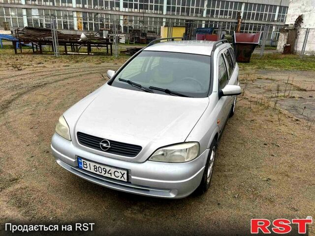 Серый Опель Астра, объемом двигателя 1.4 л и пробегом 200 тыс. км за 1900 $, фото 1 на Automoto.ua
