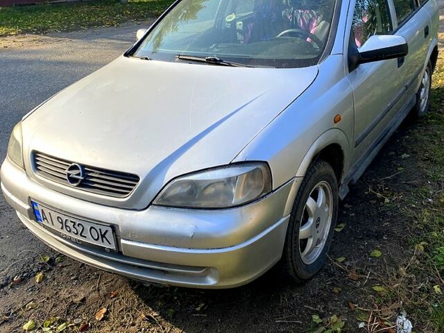 Серый Опель Астра, объемом двигателя 1.6 л и пробегом 316 тыс. км за 1800 $, фото 1 на Automoto.ua