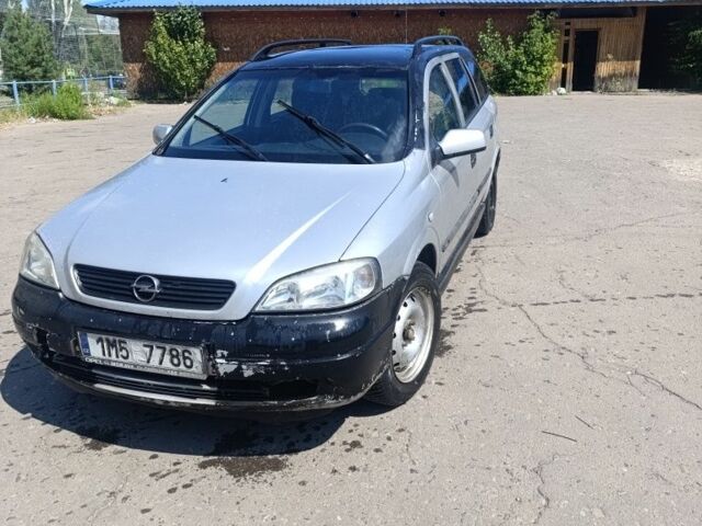 Сірий Опель Астра, об'ємом двигуна 2 л та пробігом 350 тис. км за 1001 $, фото 1 на Automoto.ua