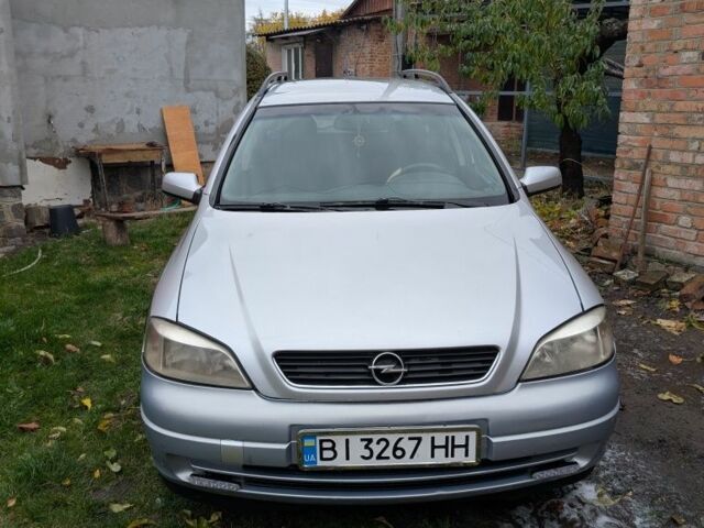 Серый Опель Астра, объемом двигателя 2 л и пробегом 420 тыс. км за 3300 $, фото 1 на Automoto.ua