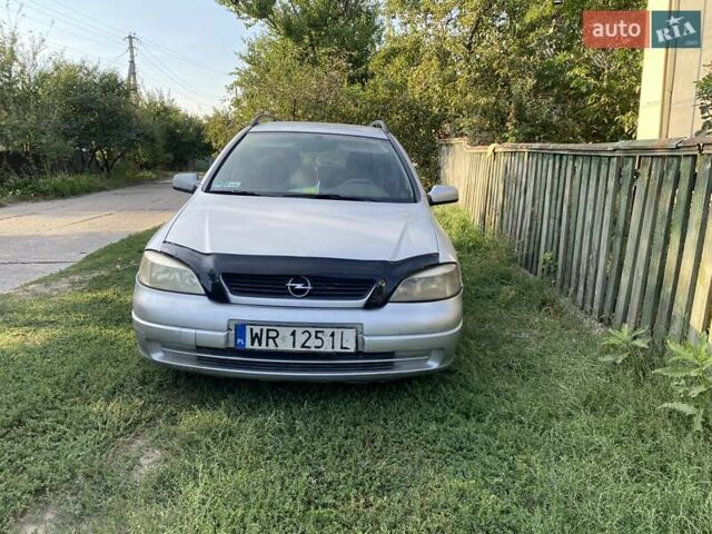 Серый Опель Астра, объемом двигателя 1.6 л и пробегом 470 тыс. км за 1000 $, фото 1 на Automoto.ua