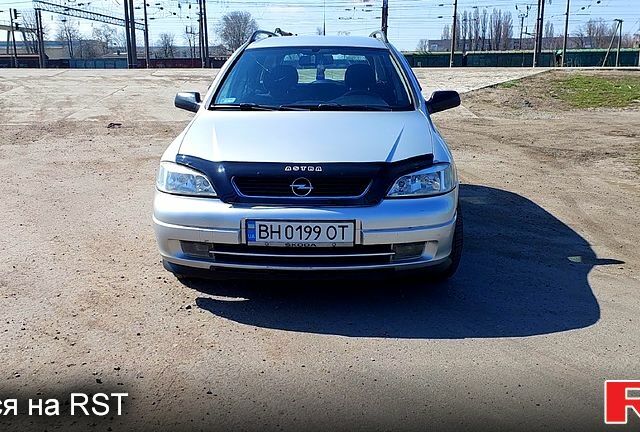 Серый Опель Астра, объемом двигателя 2 л и пробегом 300 тыс. км за 3300 $, фото 1 на Automoto.ua