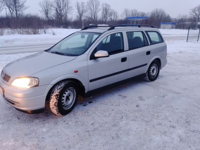 Серый Опель Астра, объемом двигателя 1 л и пробегом 222 тыс. км за 1850 $, фото 1 на Automoto.ua