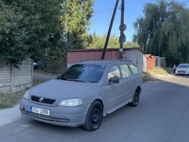 Серый Опель Астра, объемом двигателя 1.6 л и пробегом 333 тыс. км за 1250 $, фото 1 на Automoto.ua