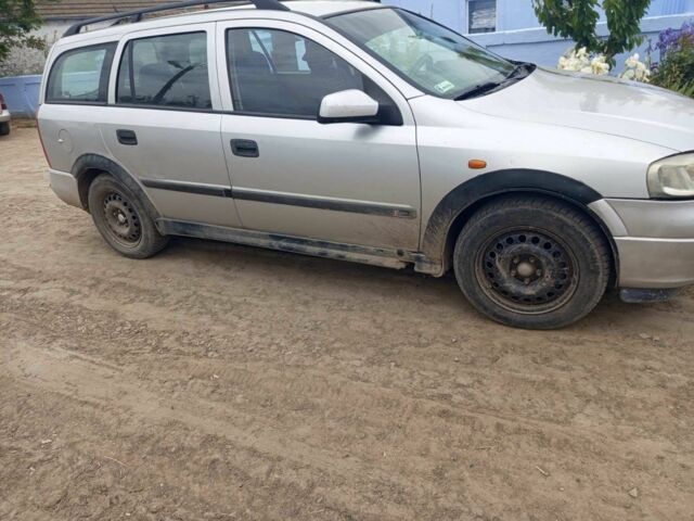 Серый Опель Астра, объемом двигателя 2 л и пробегом 240 тыс. км за 2000 $, фото 1 на Automoto.ua