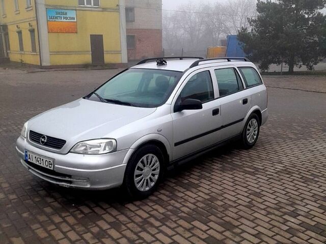 Серый Опель Астра, объемом двигателя 1.6 л и пробегом 123 тыс. км за 2200 $, фото 1 на Automoto.ua