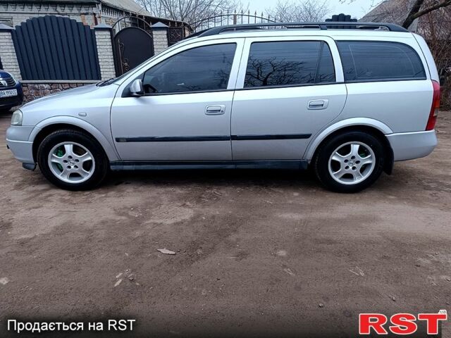 Серый Опель Астра, объемом двигателя 2 л и пробегом 290 тыс. км за 3500 $, фото 1 на Automoto.ua