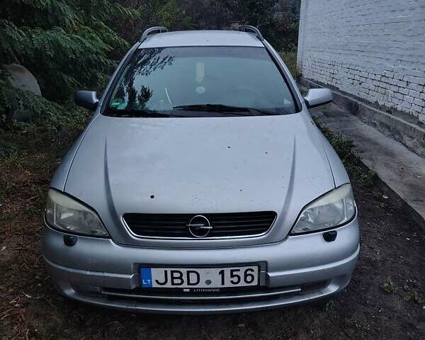 Серый Опель Астра, объемом двигателя 1.6 л и пробегом 344 тыс. км за 2100 $, фото 1 на Automoto.ua