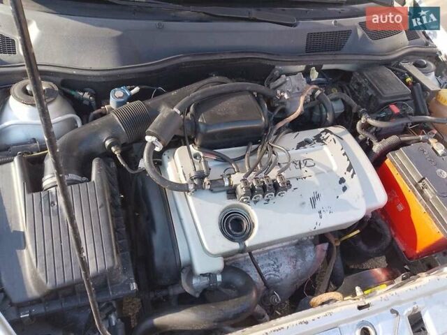 Серый Опель Астра, объемом двигателя 1.6 л и пробегом 302 тыс. км за 3200 $, фото 1 на Automoto.ua