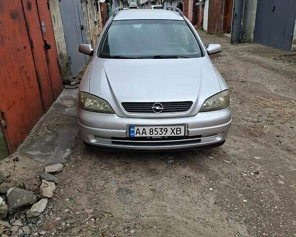 Серый Опель Астра, объемом двигателя 1.69 л и пробегом 310 тыс. км за 3100 $, фото 1 на Automoto.ua