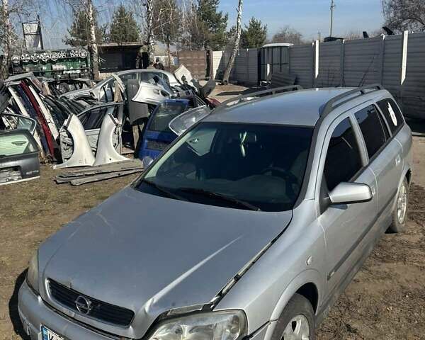 Серый Опель Астра, объемом двигателя 2 л и пробегом 280 тыс. км за 1750 $, фото 1 на Automoto.ua