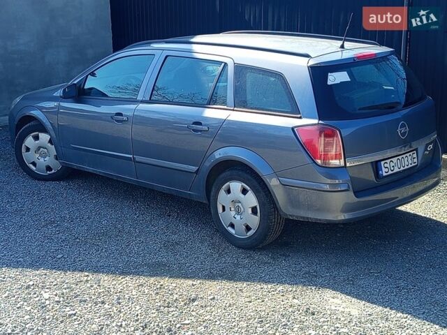 Серый Опель Астра, объемом двигателя 1.9 л и пробегом 300 тыс. км за 1750 $, фото 1 на Automoto.ua