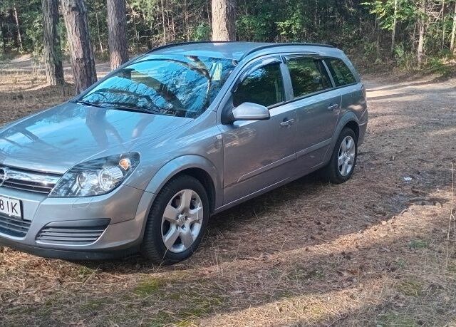 Сірий Опель Астра, об'ємом двигуна 1.6 л та пробігом 186 тис. км за 6001 $, фото 1 на Automoto.ua