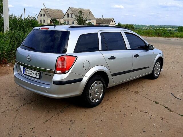 Серый Опель Астра, объемом двигателя 1.6 л и пробегом 294 тыс. км за 5000 $, фото 1 на Automoto.ua