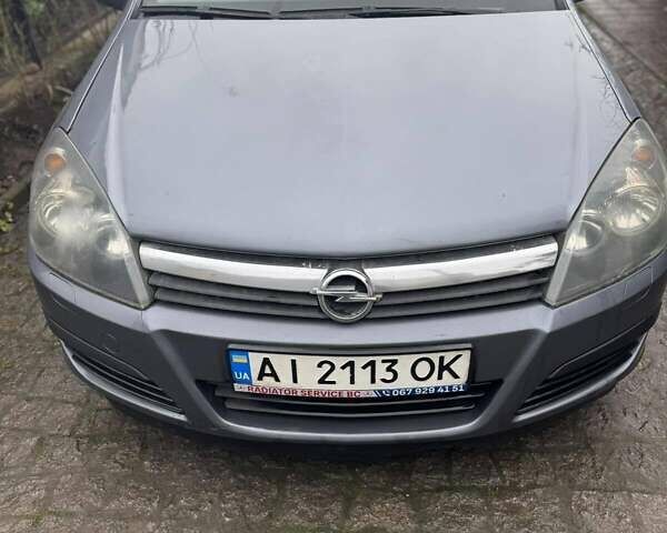 Серый Опель Астра, объемом двигателя 1.6 л и пробегом 180 тыс. км за 4200 $, фото 1 на Automoto.ua