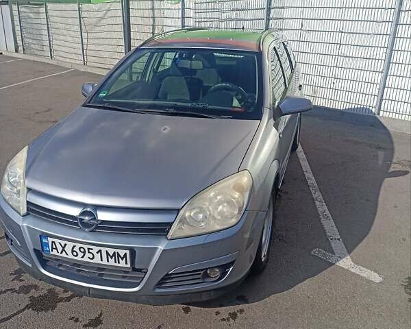 Серый Опель Астра, объемом двигателя 1.6 л и пробегом 230 тыс. км за 5700 $, фото 1 на Automoto.ua