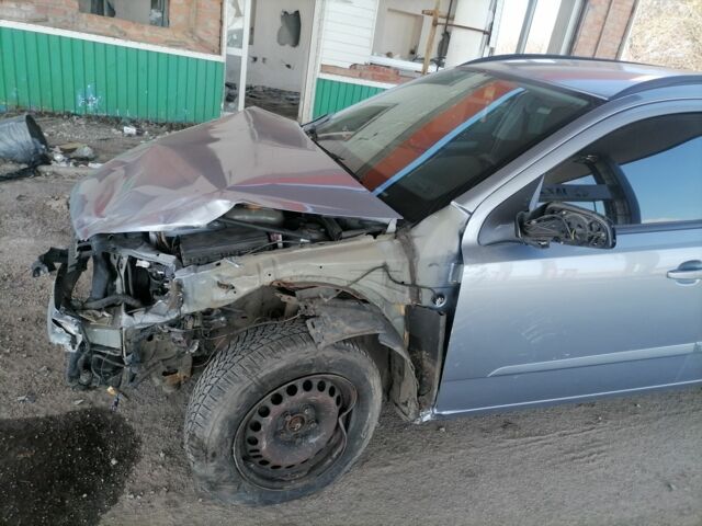 Серый Опель Астра, объемом двигателя 1.6 л и пробегом 230 тыс. км за 1500 $, фото 1 на Automoto.ua