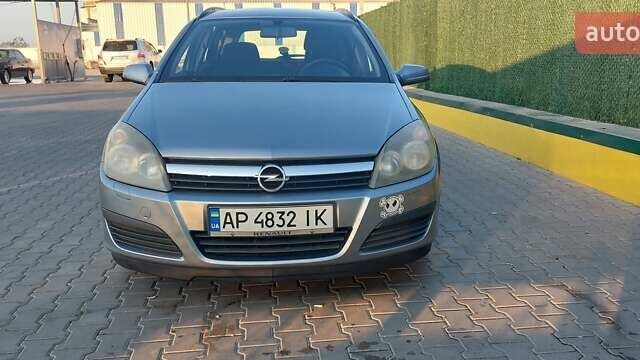Серый Опель Астра, объемом двигателя 1.6 л и пробегом 243 тыс. км за 5000 $, фото 1 на Automoto.ua