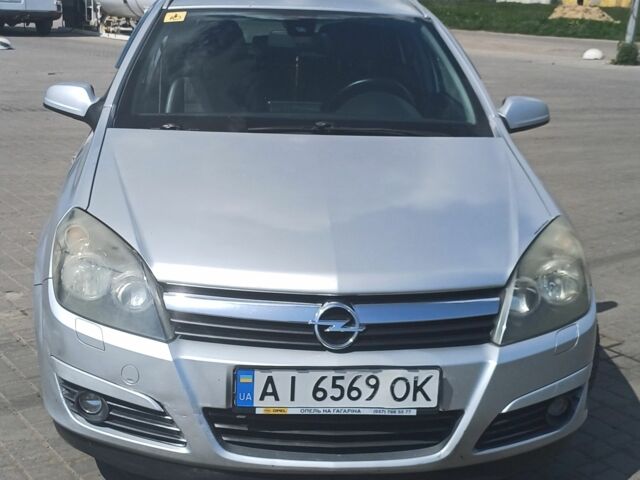 Серый Опель Астра, объемом двигателя 1.8 л и пробегом 420 тыс. км за 4400 $, фото 1 на Automoto.ua