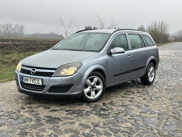 Серый Опель Астра, объемом двигателя 1.7 л и пробегом 305 тыс. км за 1950 $, фото 1 на Automoto.ua