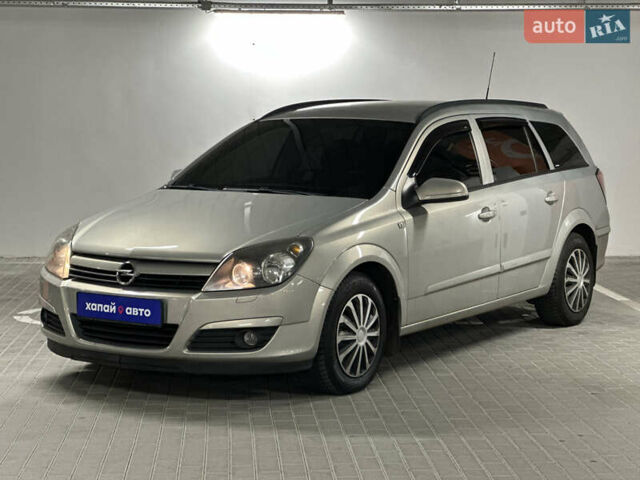Серый Опель Астра, объемом двигателя 1.6 л и пробегом 297 тыс. км за 4400 $, фото 1 на Automoto.ua