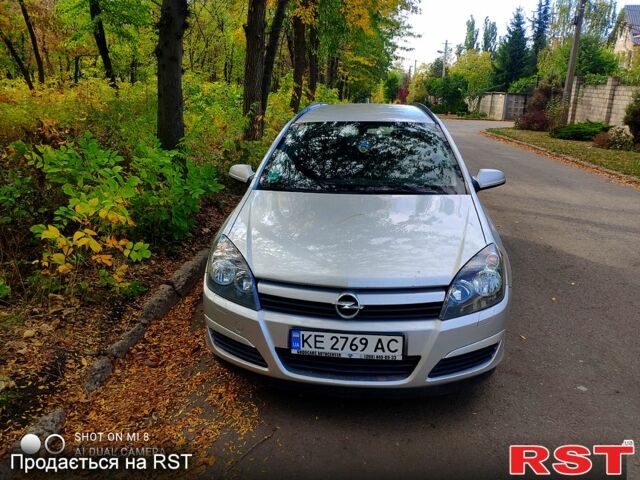 Серый Опель Астра, объемом двигателя 1.4 л и пробегом 240 тыс. км за 4840 $, фото 1 на Automoto.ua