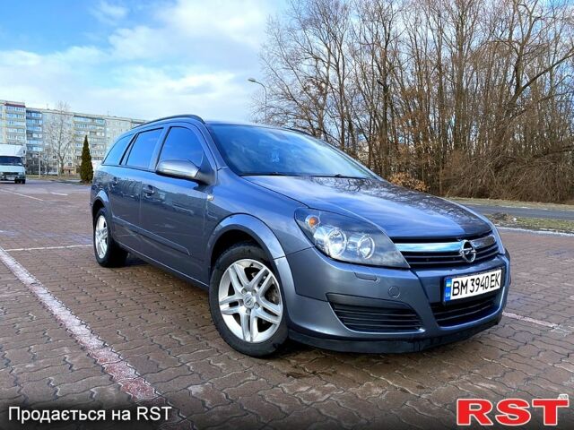 Серый Опель Астра, объемом двигателя 1.4 л и пробегом 243 тыс. км за 5200 $, фото 1 на Automoto.ua