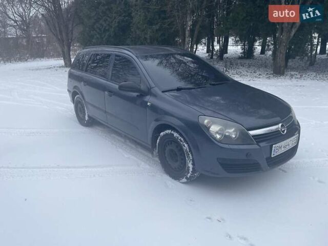 Серый Опель Астра, объемом двигателя 1.25 л и пробегом 212 тыс. км за 5000 $, фото 1 на Automoto.ua