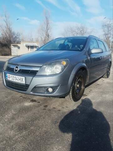 Серый Опель Астра, объемом двигателя 1.6 л и пробегом 301 тыс. км за 4950 $, фото 1 на Automoto.ua