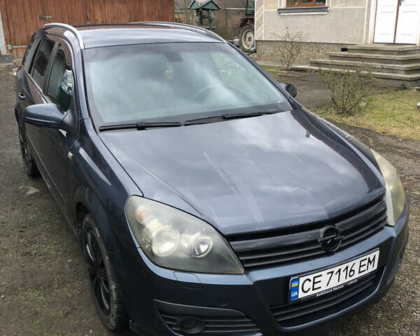 Серый Опель Астра, объемом двигателя 1.25 л и пробегом 345 тыс. км за 4650 $, фото 1 на Automoto.ua