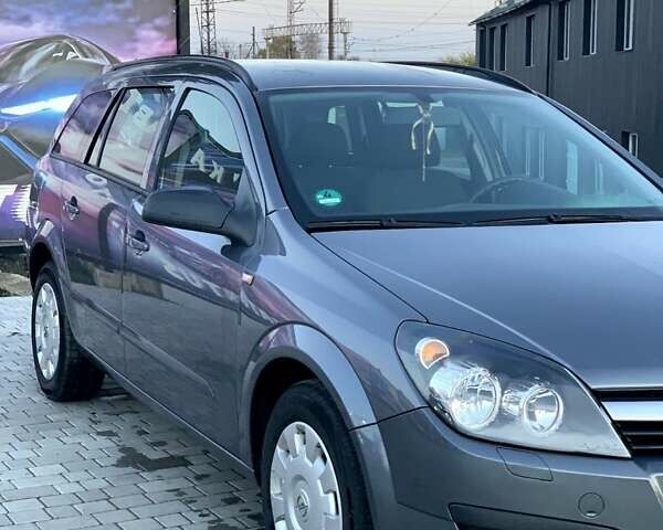 Серый Опель Астра, объемом двигателя 1.4 л и пробегом 171 тыс. км за 5000 $, фото 1 на Automoto.ua