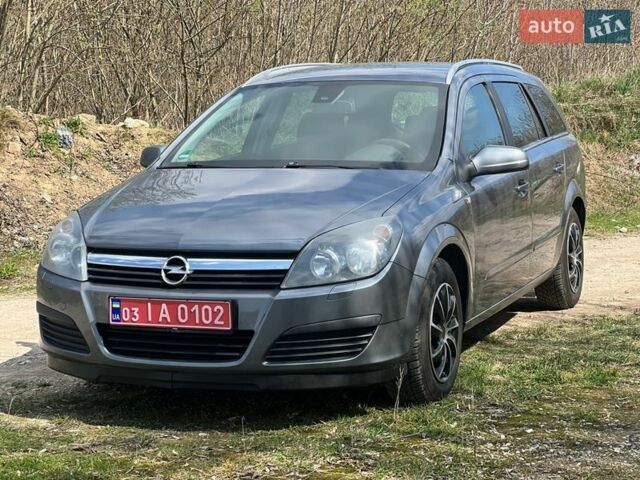 Серый Опель Астра, объемом двигателя 0 л и пробегом 220 тыс. км за 5600 $, фото 1 на Automoto.ua