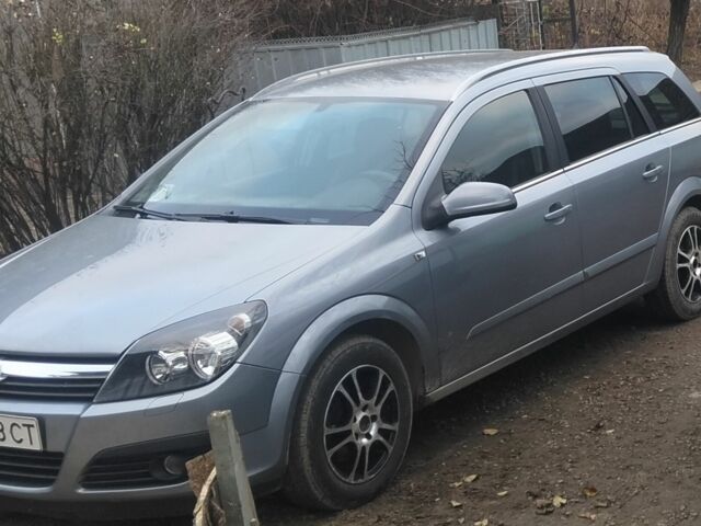 Серый Опель Астра, объемом двигателя 1 л и пробегом 240 тыс. км за 4200 $, фото 1 на Automoto.ua