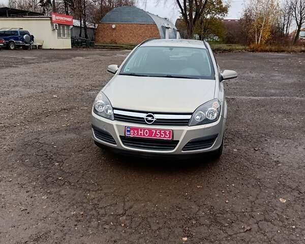 Серый Опель Астра, объемом двигателя 1.4 л и пробегом 206 тыс. км за 4950 $, фото 1 на Automoto.ua
