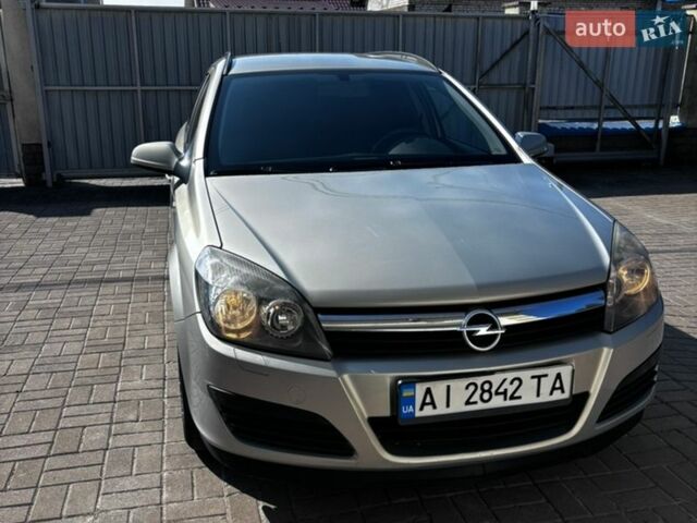 Серый Опель Астра, объемом двигателя 1.8 л и пробегом 212 тыс. км за 7000 $, фото 1 на Automoto.ua