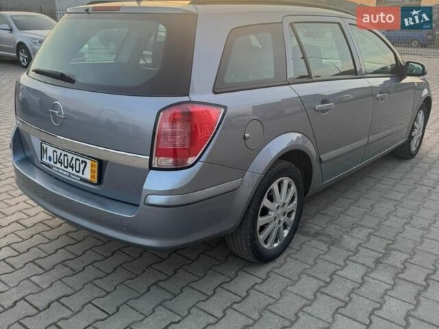 Серый Опель Астра, объемом двигателя 1.4 л и пробегом 151 тыс. км за 4999 $, фото 1 на Automoto.ua