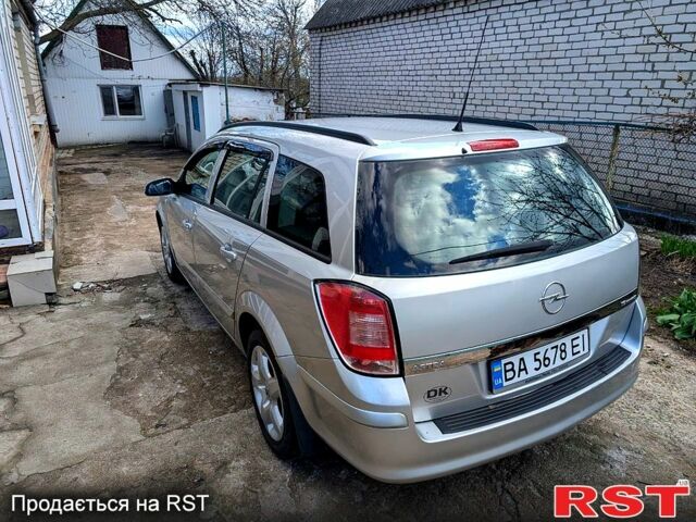Серый Опель Астра, объемом двигателя 1.6 л и пробегом 219 тыс. км за 5700 $, фото 1 на Automoto.ua