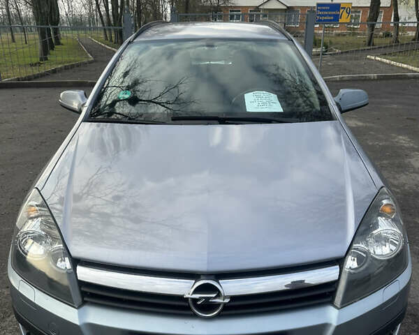 Серый Опель Астра, объемом двигателя 1.6 л и пробегом 212 тыс. км за 5900 $, фото 1 на Automoto.ua