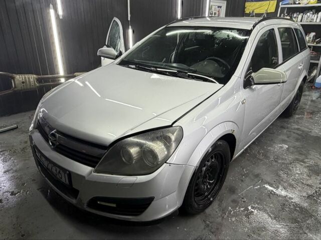 Серый Опель Астра, объемом двигателя 1.7 л и пробегом 240 тыс. км за 1600 $, фото 1 на Automoto.ua