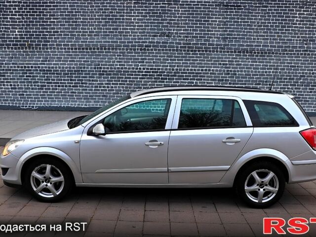 Серый Опель Астра, объемом двигателя 1.7 л и пробегом 239 тыс. км за 4999 $, фото 1 на Automoto.ua