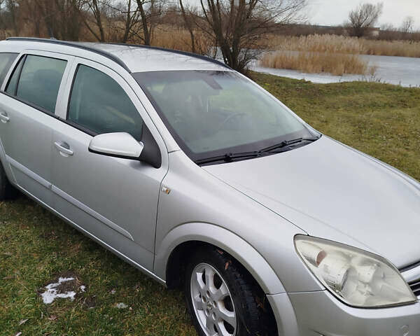 Серый Опель Астра, объемом двигателя 1.69 л и пробегом 249 тыс. км за 5500 $, фото 1 на Automoto.ua