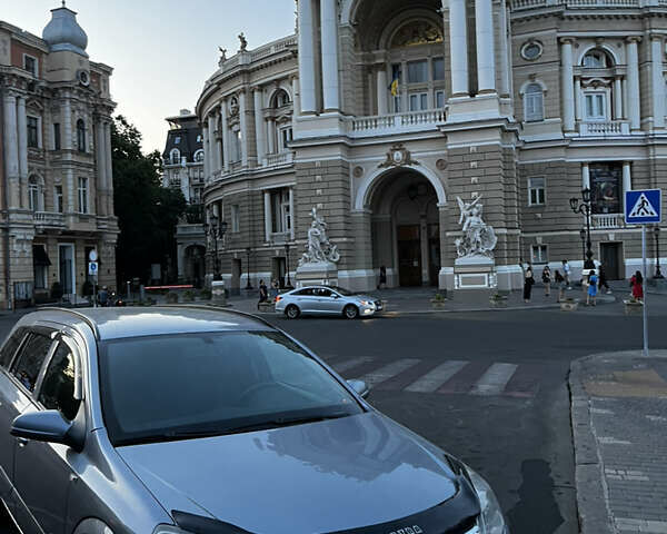 Серый Опель Астра, объемом двигателя 1.69 л и пробегом 250 тыс. км за 3500 $, фото 1 на Automoto.ua