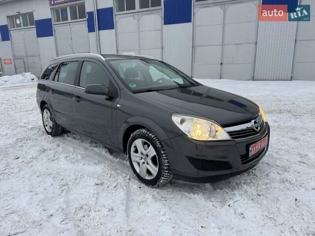 Серый Опель Астра, объемом двигателя 1.4 л и пробегом 207 тыс. км за 4990 $, фото 1 на Automoto.ua