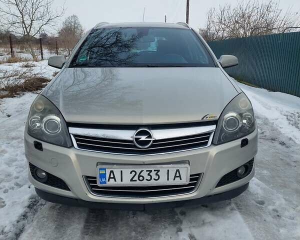 Сірий Опель Астра, об'ємом двигуна 1.69 л та пробігом 327 тис. км за 5800 $, фото 1 на Automoto.ua