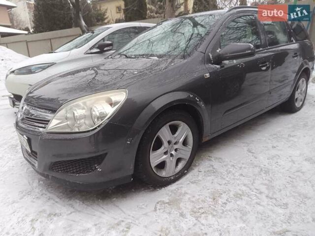 Серый Опель Астра, объемом двигателя 1.69 л и пробегом 235 тыс. км за 5600 $, фото 1 на Automoto.ua